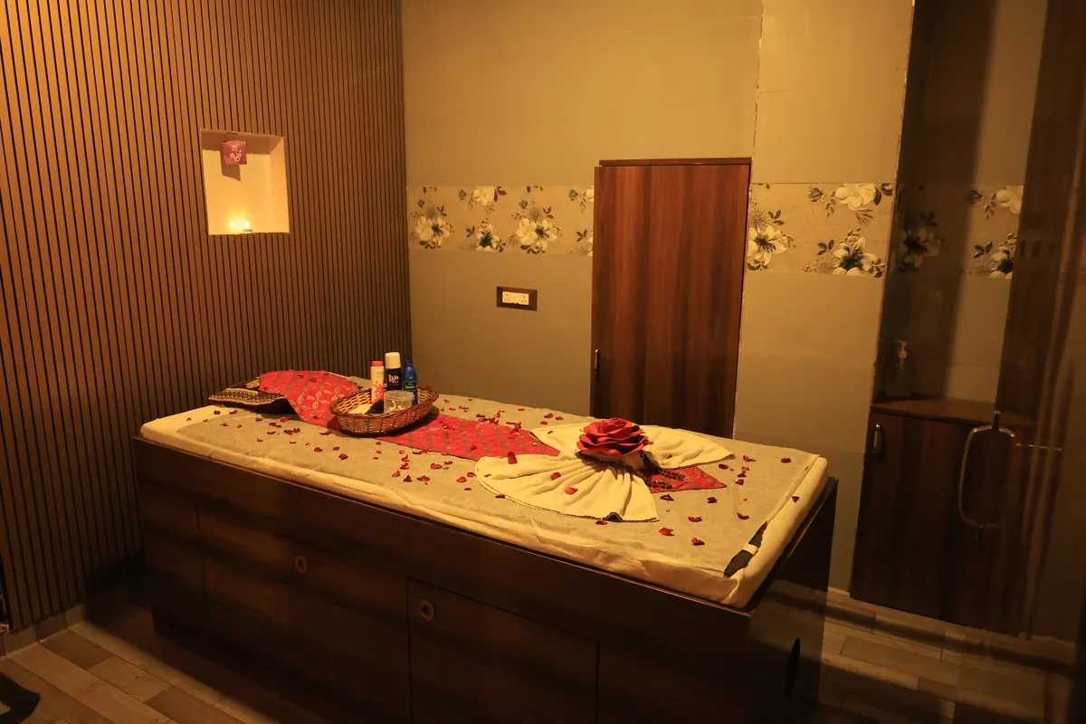 Private massage room with wood panelling at Inara Spa, Mira Road
