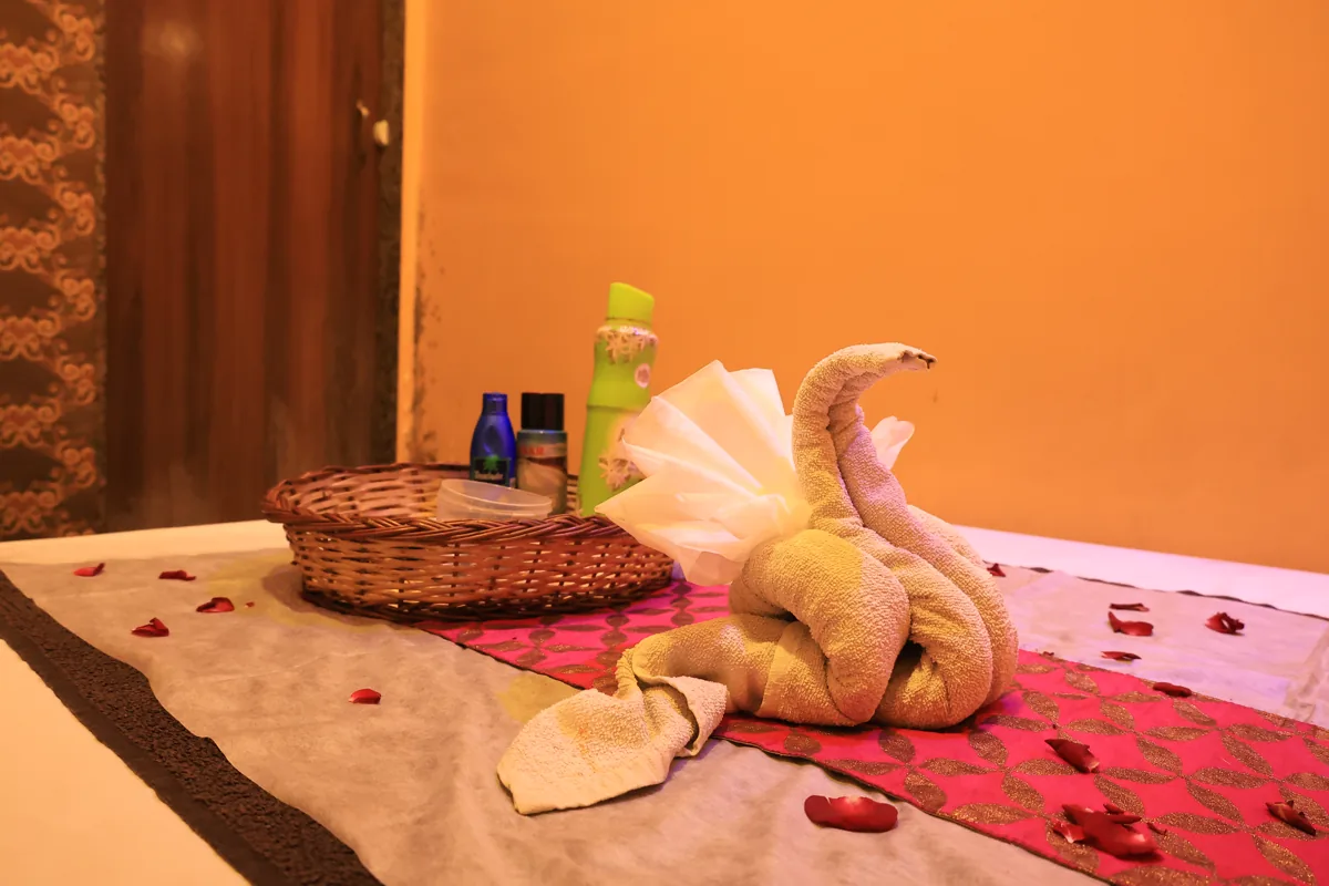 Towels and spa essentials set out before a massage at Inara Spa, Mira Road